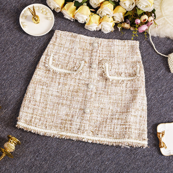 Naiste moodne kõrge vöökoha ja pärlitega seelik