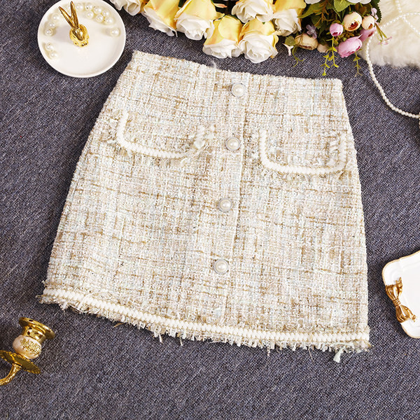 Naiste moodne kõrge vöökoha ja pärlitega seelik