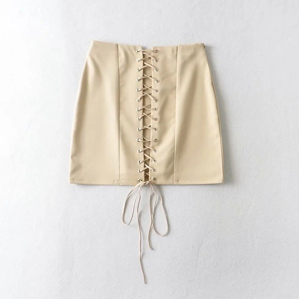 Lühike lipsudega seelik naistele