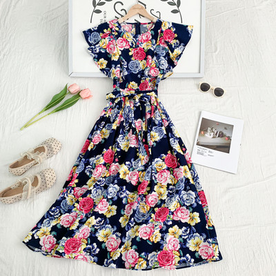 Rochie moderna de dama cu model floral si decolteu rotund