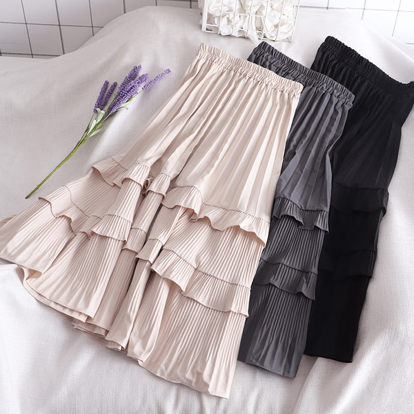 Ženska suknja s elastičnim strukom i kovrčama