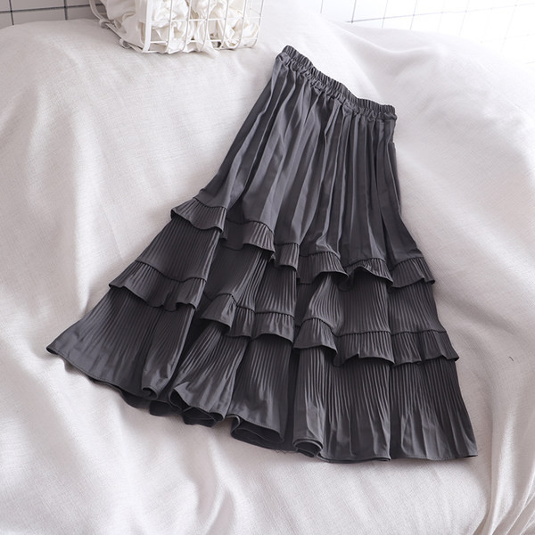 Ženska suknja s elastičnim strukom i kovrčama