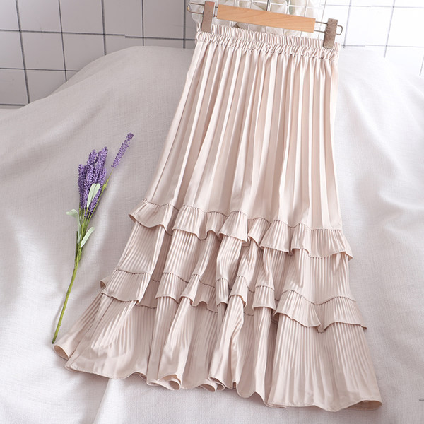 Ženska suknja s elastičnim strukom i kovrčama