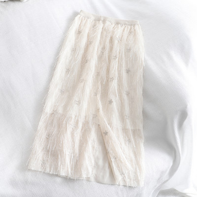 Μοντέρνα γυναικεία φούστα με ελαστική μέση και φούντες