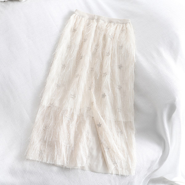 Μοντέρνα γυναικεία φούστα με ελαστική μέση και φούντες