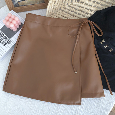 Ασύμμετρο μοντέλο γυναικεία έκο δερμάτινη φούστα με κορδέλα