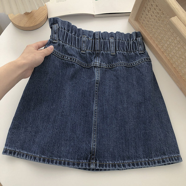 Naiste kõrge vöökoha ja taskutega teksaseelik