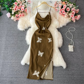 Ženska haljina na tanke naramenice s prorezom i vezom