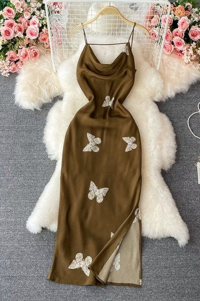 Ženska haljina na tanke naramenice s prorezom i vezom