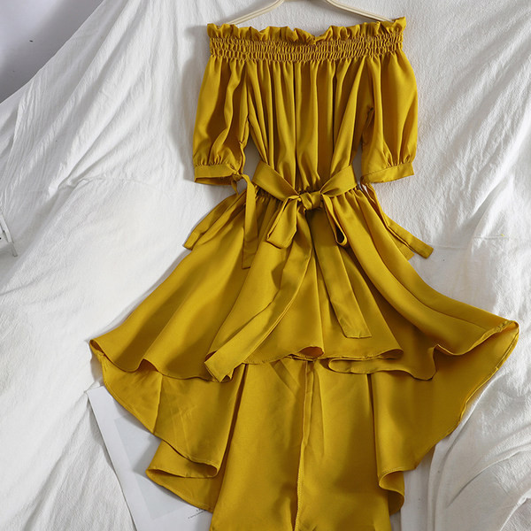 Novi model asimetrične ženske haljine sa lađa izrezom i pojasom