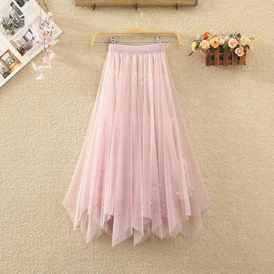 Naiste pikk tülli ja pärlitega seelik