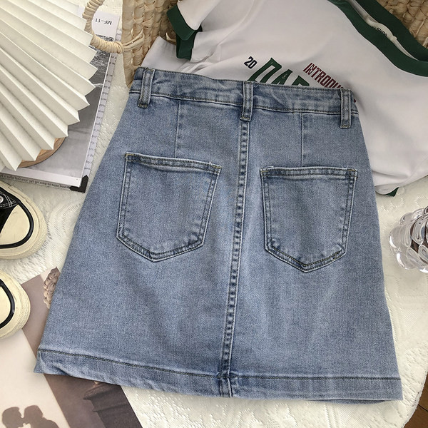 Naiste teksaseelik nööpide ja taskutega