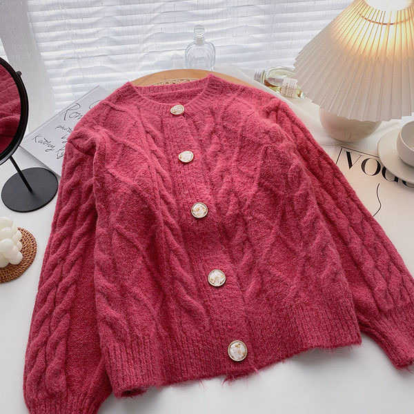 Ovaalse kaelusega ja pikkade varrukatega naiste vest