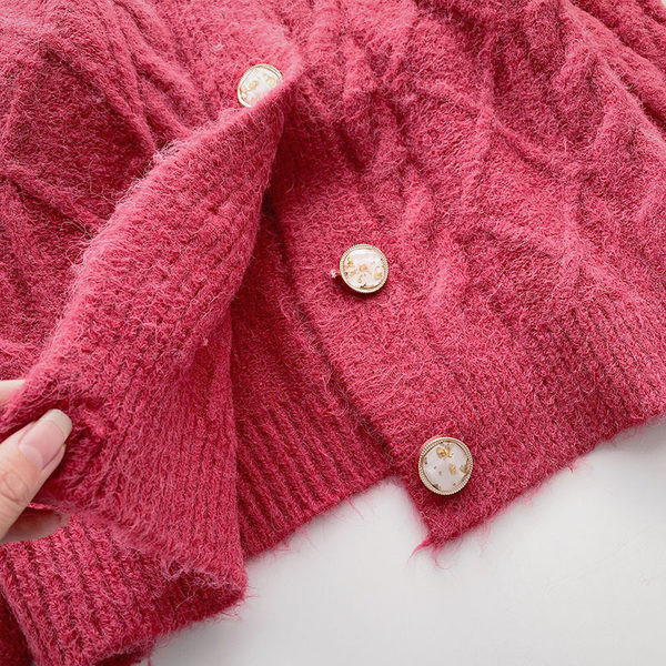 Ovaalse kaelusega ja pikkade varrukatega naiste vest