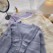 Uue mudeli vest spits-kaelusega ja nööpidega