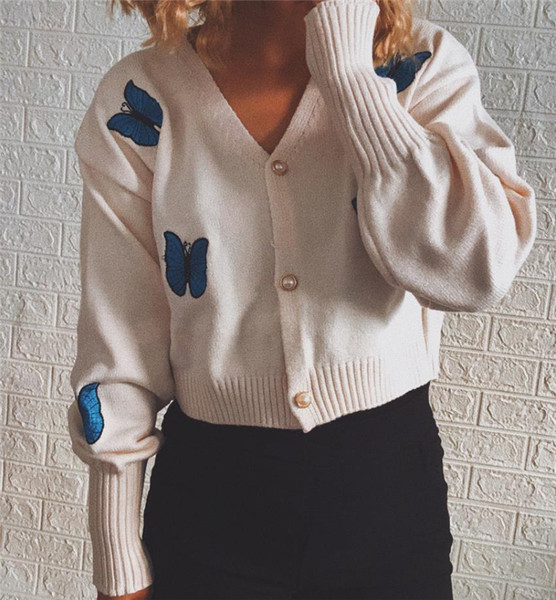 Къса дамска жилетка с бродирани цветя