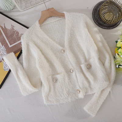 Naiste sulevest spitskaelusega ja taskutega