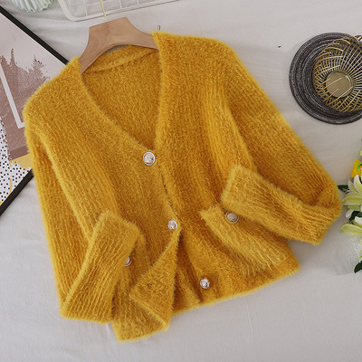 Naiste sulevest spitskaelusega ja taskutega