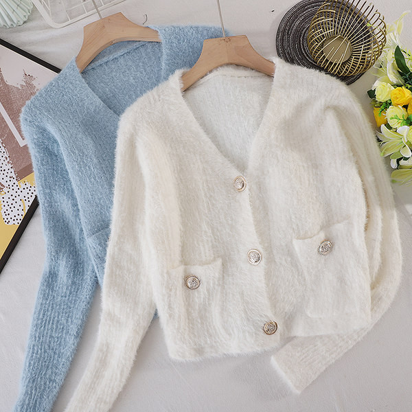 Naiste sulevest spitskaelusega ja taskutega