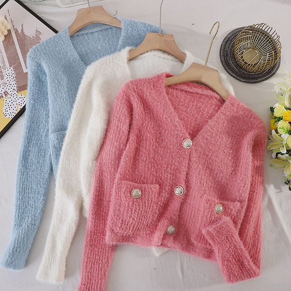 Naiste sulevest spitskaelusega ja taskutega