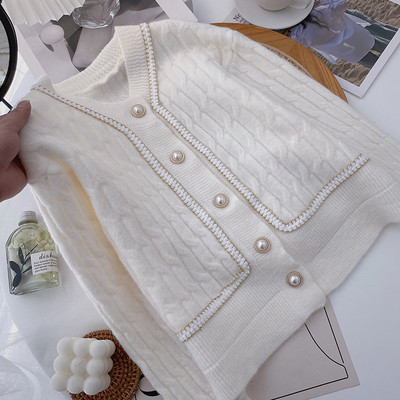 Naiste vabaaja vest nööpide ja pikkade varrukatega