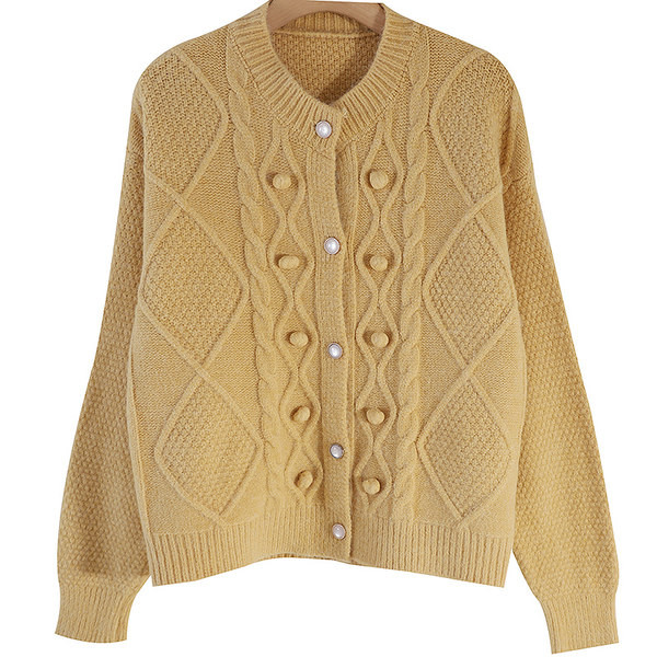 Mitmes värvitoonis pärlitega naistevest