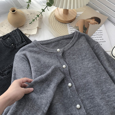 Γυναικεία ζακέτα με κουμπιά και μακριά μανίκια