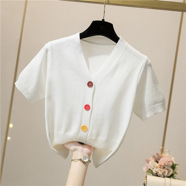 Sieviešu jaka ar īsām piedurknēm un krāsainām pogām