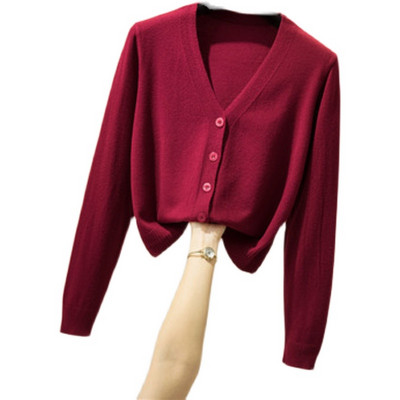 Naiste lühike vest pikkade varrukatega ja spitsikaelusega