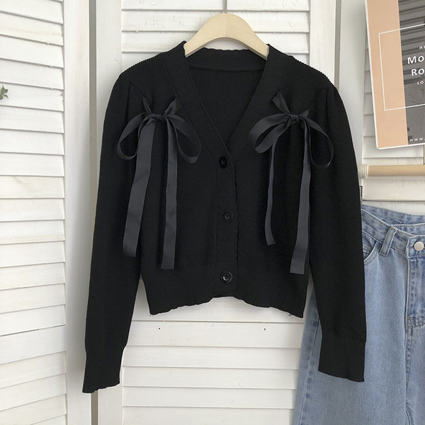 Γυναικεία πλεκτή ζακέτα και κορδόνια με κουμπιά