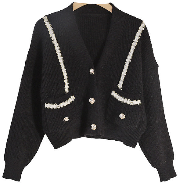 Valge ja musta värvi pärlite ja nööpidega naiste vest