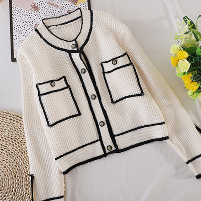 Naiste must-valge kootud vest