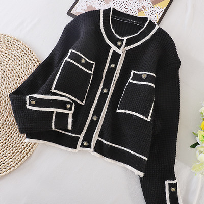 Naiste must-valge kootud vest