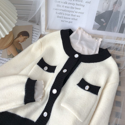 Πλεκτή γυναικεία ζακέτα με κουμπιά και τσέπες