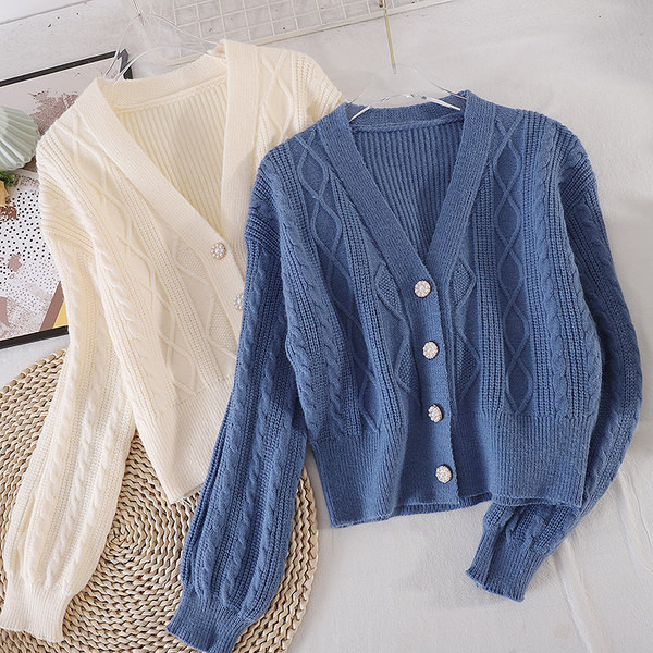 Kötött női kardigán spitz nyakkivágással és gombokkal