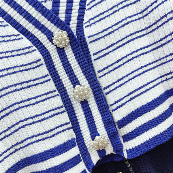 Naiste triibuline vest sügava spitsikaelusega, sinine