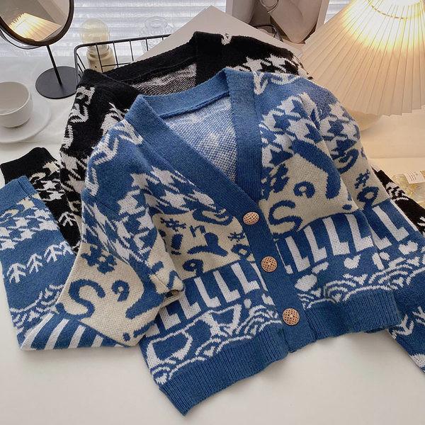 Nööpide ja spitsikaelusega talvevest