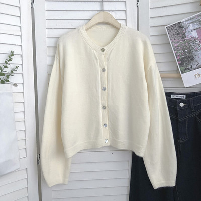 Naiste ühevärviline nööpidega vest