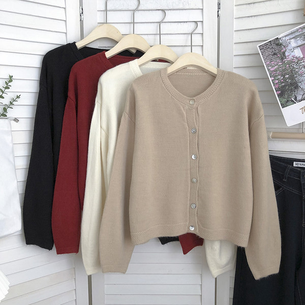 Naiste ühevärviline nööpidega vest