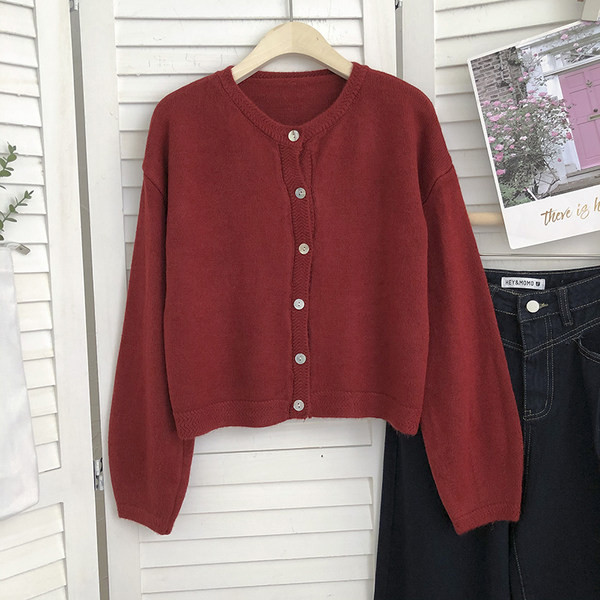 Naiste ühevärviline nööpidega vest