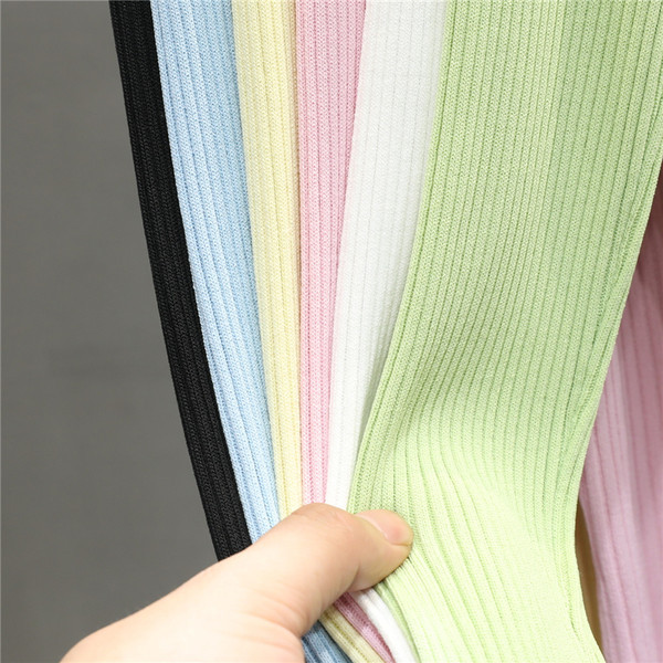 Női kardigán gyöngyház gombokkal és O-nyakkal