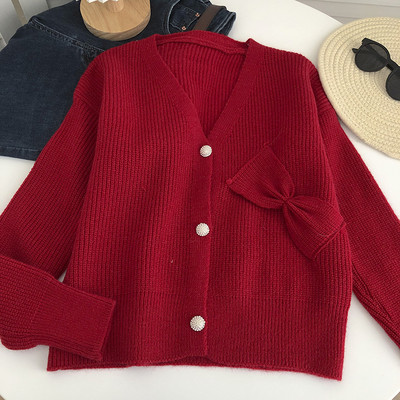 Γυναικεία πλεκτή ζακέτα  με κορδέλα