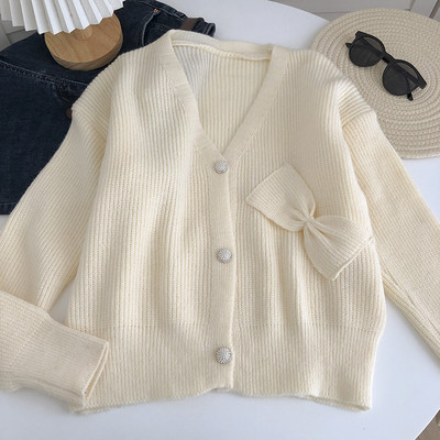 Γυναικεία πλεκτή ζακέτα  με κορδέλα