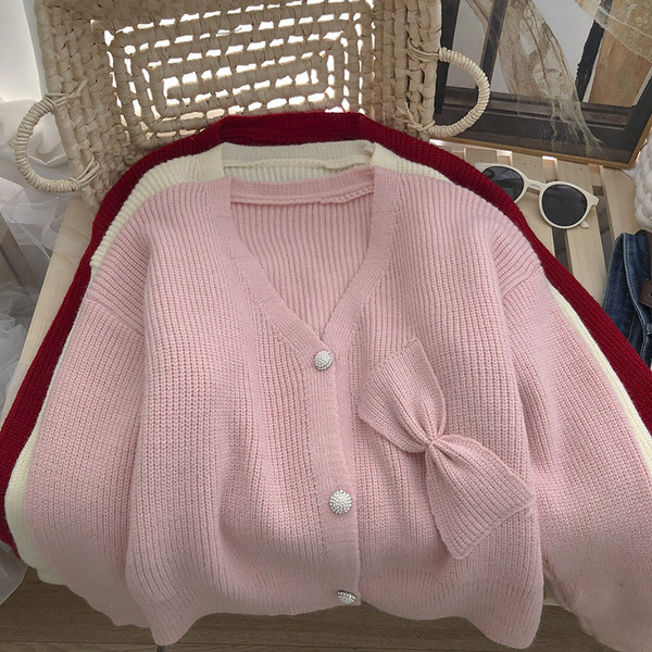 Γυναικεία πλεκτή ζακέτα  με κορδέλα