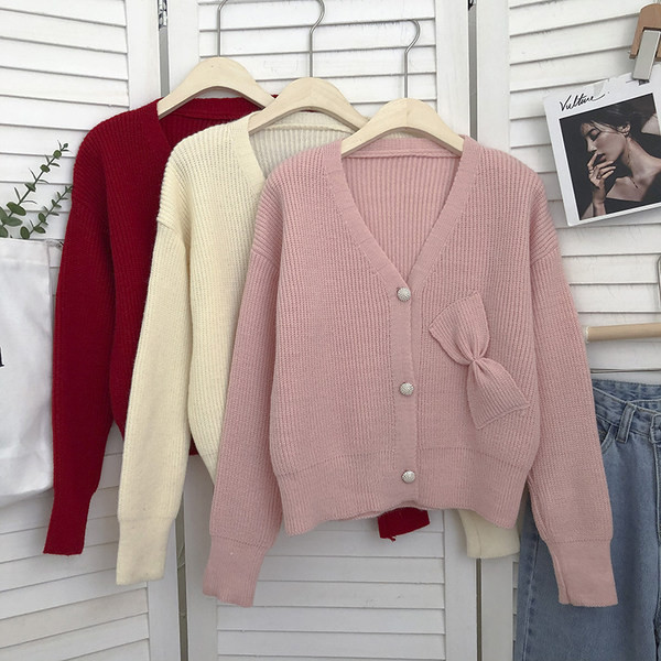 Γυναικεία πλεκτή ζακέτα  με κορδέλα