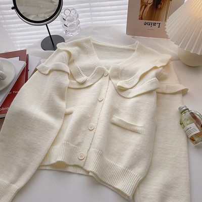 Νέο μοντέλο ζακέτα με κουμπιά και λαιμόκοψη spitz