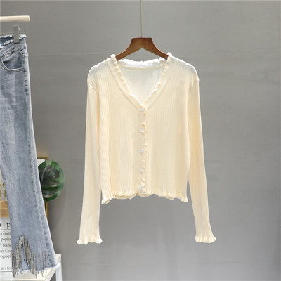 Peenikese kudumiga nööpidega lokkidega naiste kampsun