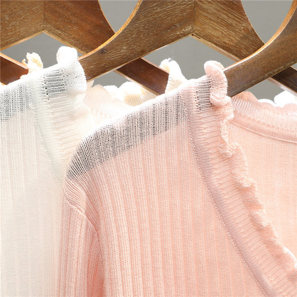 Peenikese kudumiga nööpidega lokkidega naiste kampsun