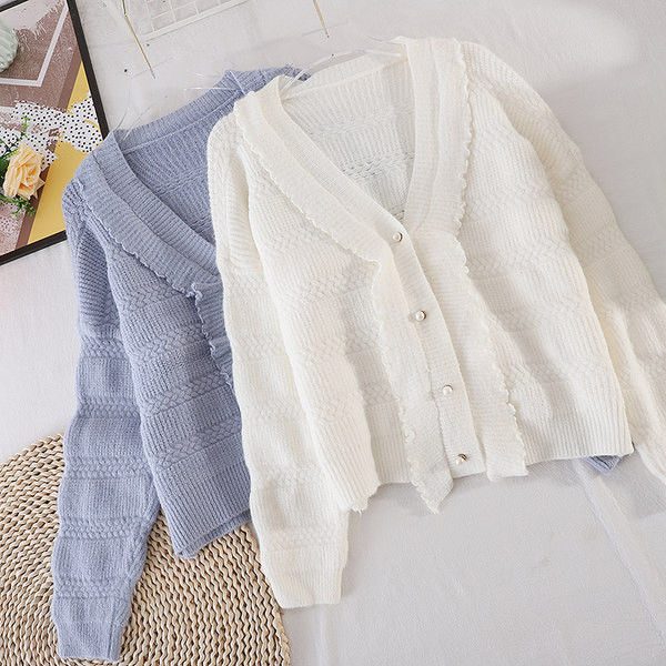 Naiste kaasaegne vest spits-kaelusega