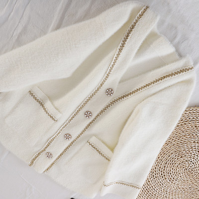 Γυναικεία μακριά ζακέτα με τσέπες και κουμπιά